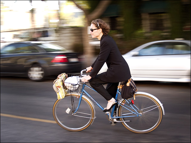 Gina riding home from a meeting